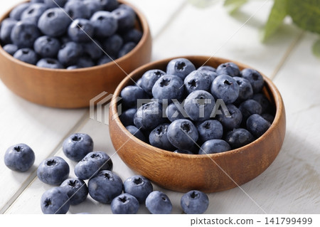 Fresh blueberries arranged on a plate Fresh blueberries arranged on a plate 141799499