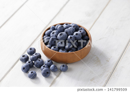 Fresh blueberries arranged on a plate Fresh blueberries arranged on a plate 141799509