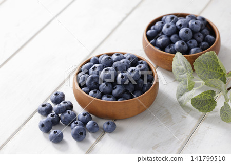 Fresh blueberries arranged on a plate Fresh blueberries arranged on a plate 141799510