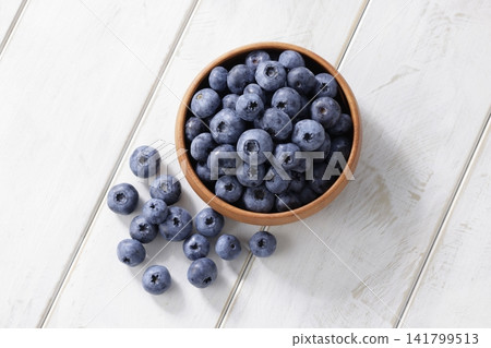 Fresh blueberries arranged on a plate Fresh blueberries arranged on a plate 141799513