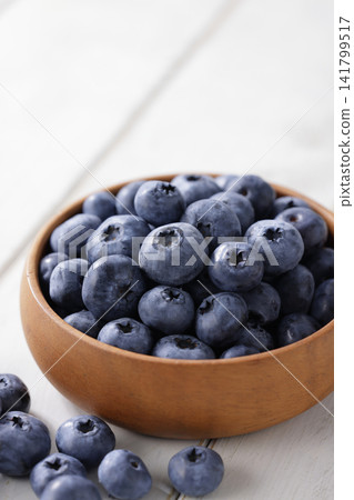 Fresh blueberries arranged on a plate Fresh blueberries arranged on a plate 141799517