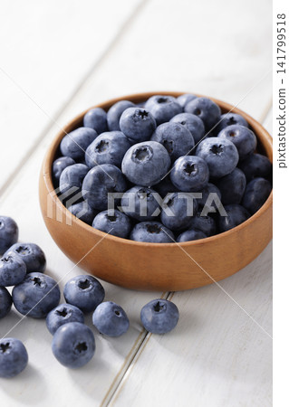 Fresh blueberries arranged on a plate Fresh blueberries arranged on a plate 141799518