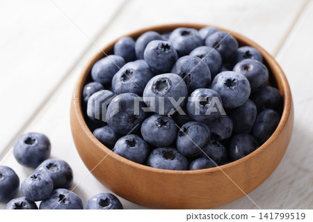 Fresh blueberries arranged on a plate Fresh blueberries arranged on a plate 141799519