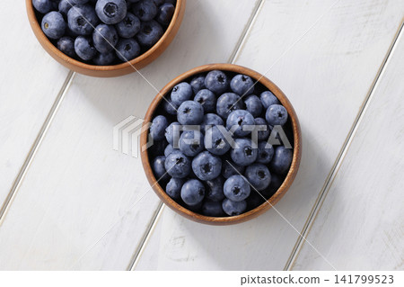Fresh blueberries arranged on a plate Fresh blueberries arranged on a plate 141799523
