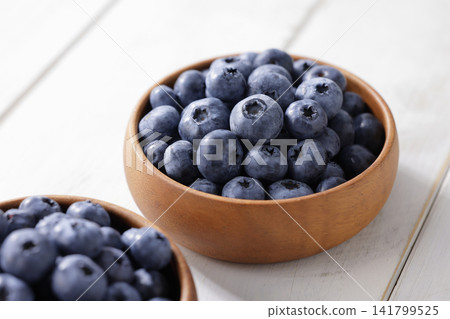Fresh blueberries arranged on a plate Fresh blueberries arranged on a plate 141799525