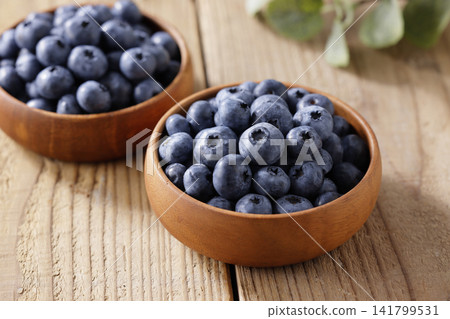 Fresh blueberries arranged on a plate Fresh blueberries arranged on a plate 141799531