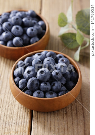 Fresh blueberries arranged on a plate Fresh blueberries arranged on a plate 141799534