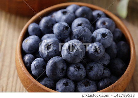 Fresh blueberries arranged on a plate Fresh blueberries arranged on a plate 141799538
