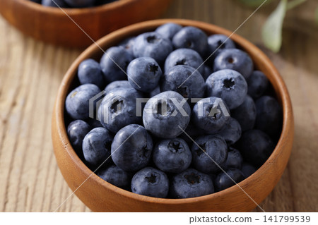 Fresh blueberries arranged on a plate Fresh blueberries arranged on a plate 141799539