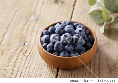 Fresh blueberries arranged on a plate Fresh blueberries arranged on a plate 141799543