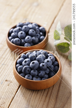 Fresh blueberries arranged on a plate Fresh blueberries arranged on a plate 141799555