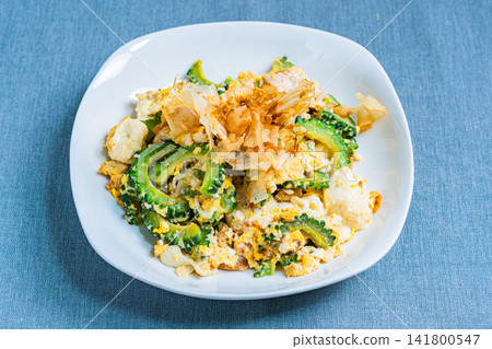Goya Champuru: An Okinawan home-style dish made with tofu and eggs. 141800547