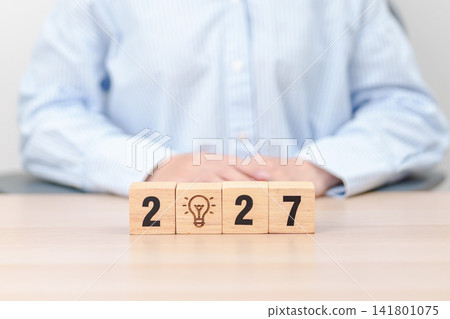 2027 year block with lightbulb. Business Idea, Creative, Thinking, brainstorm, Goal, Resolution, strategy, plan, Action, change and New Year start concepts 2027 year block with lightbulb. Business Idea, Creative, Thinking, brainstorm, Goal, Resolution, strategy, plan, Action, change and New Year start concepts 141801075