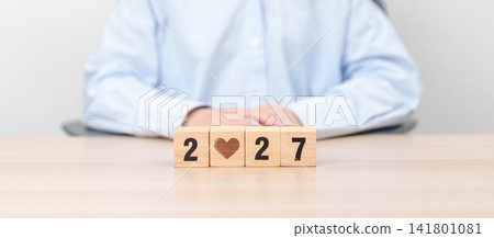 Happy New Year 2027 with heart block for health care, love, organ donation, resolution, charity, happy family, wellbeing and insurance concepts Happy New Year 2027 with heart block for health care, love, organ donation, resolution, charity, happy family, wellbeing and insurance concepts 141801081