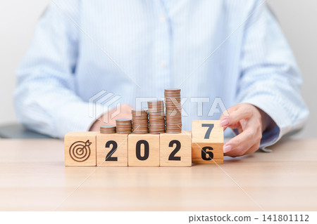 2026 end year to Happy New Year 2027 with Coins stack and dartboard icon. Strategy, goal, Money, Budget, tax, investment, financial, savings and New Year Resolution concepts 2026 end year to Happy New Year 2027 with Coins stack and dartboard icon. Strategy, goal, Money, Budget, tax, investment, financial, savings and New Year Resolution concepts 141801112