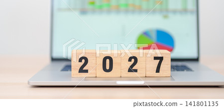 Happy New Year 2027 block with computer laptop background. Goal, Target, Resolution, strategy, plan, Action, mission, motivation, and New Year start concepts Happy New Year 2027 block with computer laptop background. Goal, Target, Resolution, strategy, plan, Action, mission, motivation, and New Year start concepts 141801135