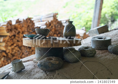Pottery and tools from a pottery studio Pottery and tools from a pottery studio 141801549