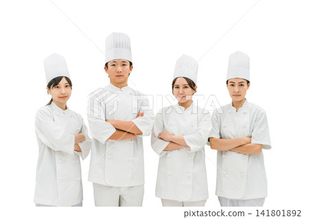 Chefs and cooks in chef coats standing in the kitchen Chefs and cooks in chef coats standing in the kitchen 141801892