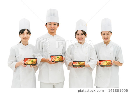 Chefs and cooks in chef coats standing in the kitchen Chefs and cooks in chef coats standing in the kitchen 141801906