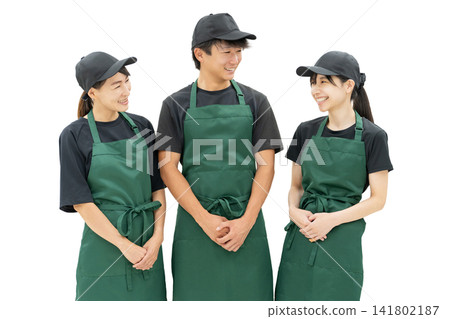 Male and female kitchen staff and cooking staff in the kitchen and back room Male and female kitchen staff and cooking staff in the kitchen and back room 141802187