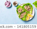 Tuna avocado salad lettuce wraps 141805159