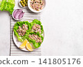 Tuna avocado salad lettuce wraps 141805176