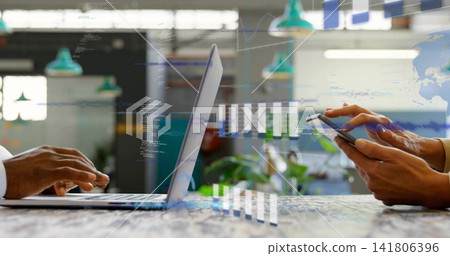 Typing on laptop left blazer cuff right long-sleeve tapping phone at coworking table with overlays Typing on laptop left blazer cuff right long-sleeve tapping phone at coworking table with overlays 141806396
