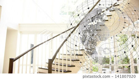 Showing curved wooden staircase rising in bright residential foyer, with wireframe globe overlay Showing curved wooden staircase rising in bright residential foyer, with wireframe globe overlay 141807020
