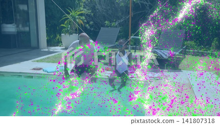 Sitting seniors with granddaughter in swimsuit dipping feet in patio pool, ring, magenta noise Sitting seniors with granddaughter in swimsuit dipping feet in patio pool, ring, magenta noise 141807318
