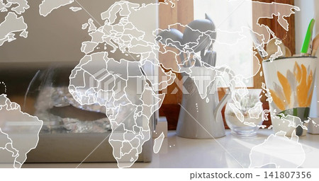 Displaying white pitcher sitting on kitchen sill with glass, floral mug, metal box, map overlay Displaying white pitcher sitting on kitchen sill with glass, floral mug, metal box, map overlay 141807356