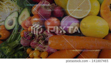 Showing cropped produce filling frame on dark slate, with carrots lemons avocados tomatoes broccoli Showing cropped produce filling frame on dark slate, with carrots lemons avocados tomatoes broccoli 141807465
