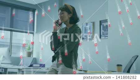 Talking woman wearing green cardigan leaning in office, holding smartphone to ear, binary overlay Talking woman wearing green cardigan leaning in office, holding smartphone to ear, binary overlay 141808282