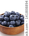 Fresh blueberries placed against a white background Fresh blueberries placed against a white background 141808894