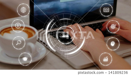 Typing hands working on silver laptop keyboard at cafe counter, coffee cup and HUD overlays Typing hands working on silver laptop keyboard at cafe counter, coffee cup and HUD overlays 141809236