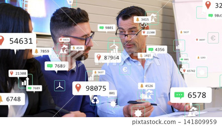 Discussing colleagues studying AR overlays at meeting table in business attire, holding smartphone Discussing colleagues studying AR overlays at meeting table in business attire, holding smartphone 141809959
