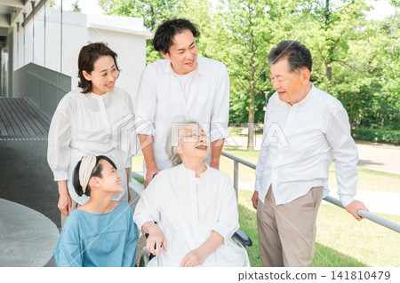 A three-generation family visiting a hospital or nursing home A three-generation family visiting a hospital or nursing home 141810479
