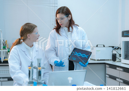 Agricultural biotechnology experiment by female scientists for medicine discovery. Agricultural biotechnology experiment by female scientists for medicine discovery. 141812661