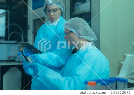 Agricultural biotechnology experiment by female scientists for medicine discovery. Agricultural biotechnology experiment by female scientists for medicine discovery. 141812671