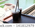 Two iced coffees in plastic cups Two iced coffees in plastic cups 141812979