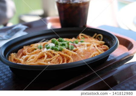 Pasta in a plastic container 141812980