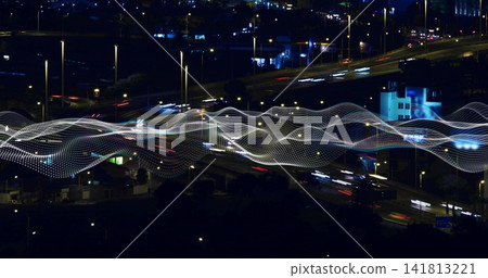Streaming dotted wave ribbon floating above multilane highway at night, with vehicle light trails Streaming dotted wave ribbon floating above multilane highway at night, with vehicle light trails 141813221