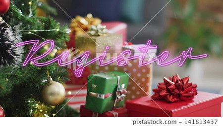 Displaying wrapped gifts with red-bowed box by evergreen tree, neon Register sign, copy space Displaying wrapped gifts with red-bowed box by evergreen tree, neon Register sign, copy space 141813437