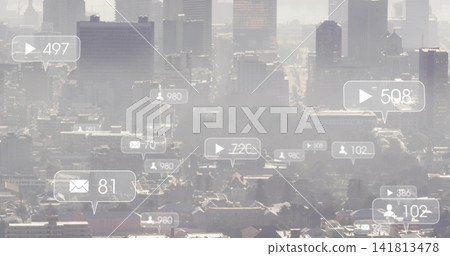 Displaying hazy city skyline with notification bubbles showing play, mail, user icons Displaying hazy city skyline with notification bubbles showing play, mail, user icons 141813478