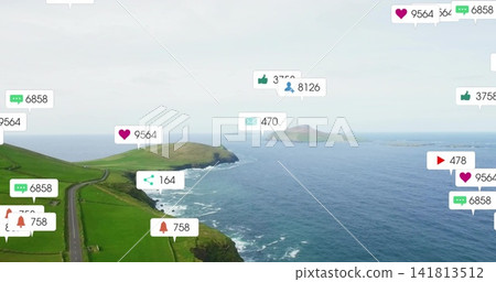 Showing coastal peninsula with winding road along green cliffs and pastures, floating social badges Showing coastal peninsula with winding road along green cliffs and pastures, floating social badges 141813512