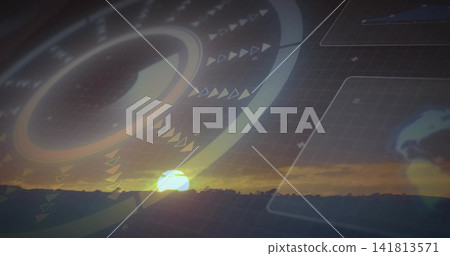Overlaying translucent HUD ring merging with sun disk over hill ridge at sunset, showing grid Overlaying translucent HUD ring merging with sun disk over hill ridge at sunset, showing grid 141813571