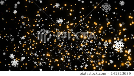 Glittering white snowflake shapes floating on dark backdrop, showing warm golden bokeh orbs Glittering white snowflake shapes floating on dark backdrop, showing warm golden bokeh orbs 141813689