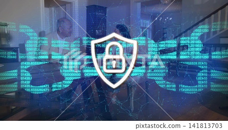 Showing central shield padlock at home, man in light shirt talking, woman in dark top listening Showing central shield padlock at home, man in light shirt talking, woman in dark top listening 141813703