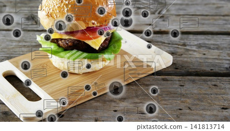 Featuring cheeseburger with sesame bun, cheddar sitting on board, with chat bubbles, user icons 141813714