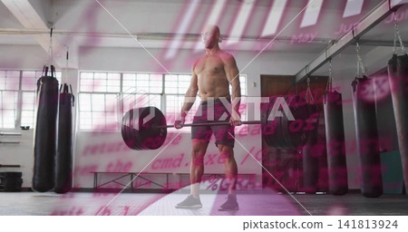 Lifting muscular man pulling Olympic barbell on rubber mat in gym, shirtless dark shorts Lifting muscular man pulling Olympic barbell on rubber mat in gym, shirtless dark shorts 141813924