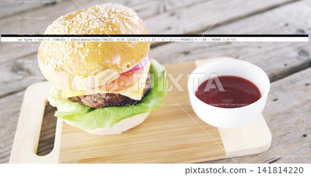 Sesame burger sitting on cutting board on rustic plank table, with ketchup bowl, cheese, code lines Sesame burger sitting on cutting board on rustic plank table, with ketchup bowl, cheese, code lines 141814220